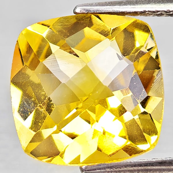 Natural Yellow Citrine 3.63 Ct. Cushion Checkerboard Cut 10 x 9.9 Mm Gemstone From Brazil: Product ID: 801815238 Product Name: Natural Citrine Weight: 3.63 CT. Size: 10 x 9.9 x 6.4 MM. Shape: Cushion Checkerboard Cut Color: Yellow Clarity:VVS - VSI Luster: Good Gems Origin: Brazil Treatment