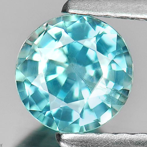Natural Blue Zircon 1.04 Ct. Round Shape 6 Mm Gemstone From Cambodia: Product ID: 807721106 Product Name: Natural Zircon Weight: 1.04 CT. Size: 6 x 6 x 3.2 MM. Shape: Round Diamond Cut Color: Blue Clarity:VVS Luster: Good Gems Origin: Cambodia Treatment: Heated Crystal