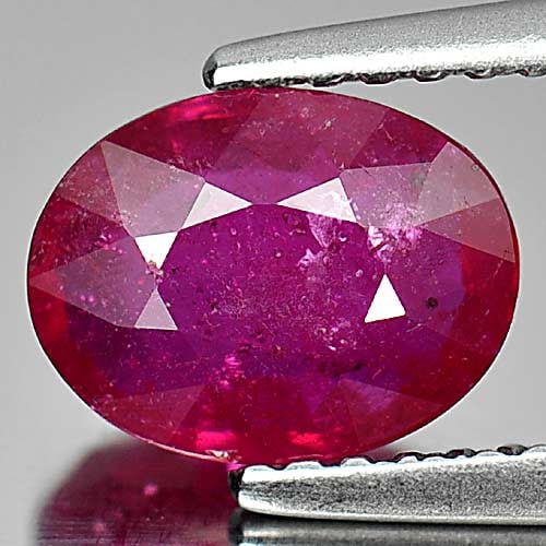 Natural Purplish Pink Ruby 1.65 Ct. Oval Shape 8.1 x 6.2 Mm. Gemstone From Mozambique: Product ID: 805926583 Product Name: Natural Ruby Weight: 1.65 CT. Size: 8.1 x 6.2 x 3.3 MM. Shape: Oval Color: Purplish Pink Clarity:VSI Luster: Good Gems Origin: Mozambique Treatment: Heated (Lead-gl