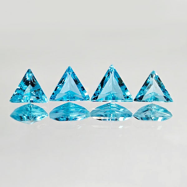 Natural Swiss Blue Topaz 2.31 Ct. 4 Pcs. VVS Trilliant Shape 6 x 6 Mm. Gemstones From Brazil: Product ID: 807167777 Product Name: Natural Blue Topaz Weight: 2.31 CT. Size: 6 x 6 x 3 MM. Shape: Trilliant Color: Blue Clarity:VVS Luster: Good Gems Origin: Brazil Treatment: Treated Crystal Structu