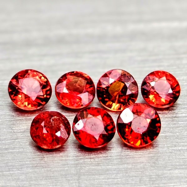 Natural Orangish Red Songea Sapphire 0.56 Ct. 7 Pcs Round Shape Gemstones From Tanzania: Product ID: 806162347 Product Name: Natural Red Sapphire Weight: 0.56 CT. Size: 2.6 x 2.6 x 1.8 to 2.3 x 2.3 x 1.6 MM. Shape: Round Color: Orange Red Clarity:VVS - VSI Luster: Good Gems Origin: Tanzan