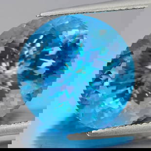 Natural Swiss Blue Topaz 15.39 Ct. Clean Round Cornflower Cut 15 Mm. Gemstone From Brazil: Product ID: 807166407 Product Name: Natural Blue Topaz Weight: 15.39 CT. Size: 15 x 15 x 10.4 MM. Shape: Round Cornflower Cut Color: Blue Clarity:IF Luster: Very Good Gems Origin: Brazil Treatment: