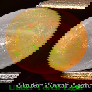 Natural Multi Color Opal 3.21 Ct. Oval Cabochon Shape 11 x 9 Mm Unheated Gemstone: Product ID: 818725788 Product Name: Natural Opal Weight: 3.21 CT. Size: 11 x 9 x 6 MM. Shape: Oval Cabochon Color: Multi-Color Clarity:Semi - Transparent Luster: Iridescent Gems Origin: Ethiopia