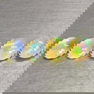 Natural Multi-Color Opal 3.05 Ct. 4 Pcs Oval Cabochon Shape 7.9 x 6 Mm. Unheated Gemstone: Product ID: 818728044 Product Name: Natural Opal Weight: 3.05 CT. Size: 7.9 x 6 x 4.4 MM. Shape: Oval Cabochon Color: Multi-Color Clarity:Semi - Transparent Luster: Good Gems Origin: Ethiopia