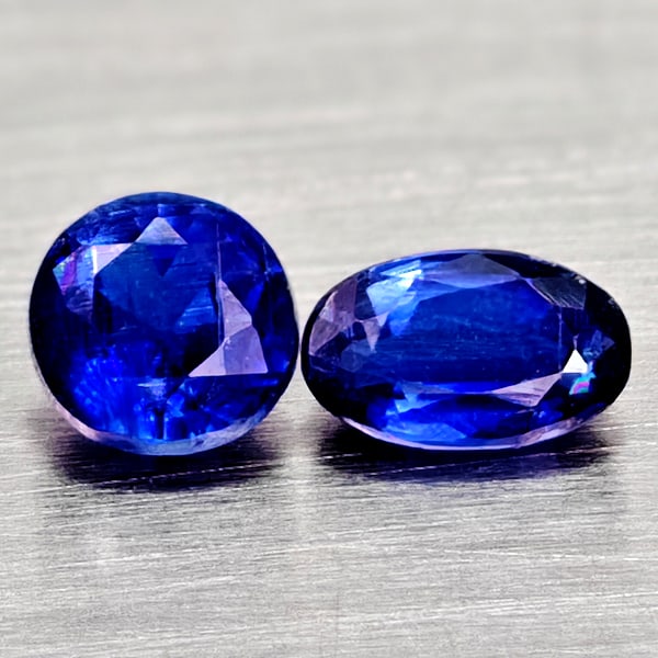 Natural Blue Kyanite 0.73 Ct. 2 Pcs Mixed Shape Gemstones From Sri - Lanka: Product ID: 804204816 Product Name: Natural Kyanite Weight: 0.73 CT. Size: 5 x 3.1 x 2.2 to 4.1 x 4.1 x 2.9 MM. Shape: Mixed Shape Color: Blue Clarity:VSI - SI1 Luster: Good Gems Origin: Sri - Lanka T