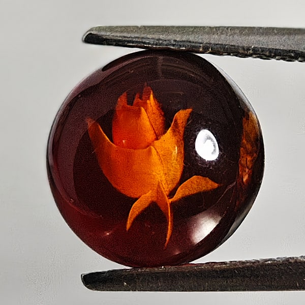 Flower Carving In Natural Brown Yellow Amber 0.57 Ct. Round Shape 7.9 Mm Gemstone From Poland: Product ID: 819090978 Product Name: Natural Amber Weight: 0.57 CT. Size: 7.9 x 7.9 x 3.2 MM. Shape: Round Cabochon Color: Brown Yellow Clarity:Semi - Transparent Luster: Good Gems Origin: Poland Treat