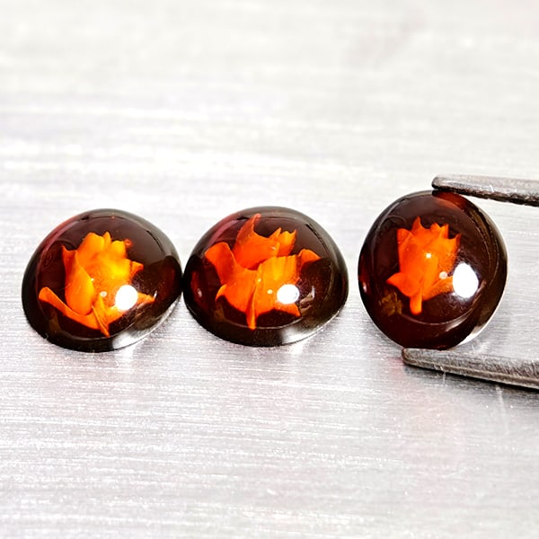 Natural Brown Yellow Amber 1.43 Ct. 3 Pcs Flower Carving In Oval Cabochon Shape Gemstones From: Product ID: 819091047 Product Name: Natural Amber Weight: 1.43 CT. Size: 8.4 x 7.4 x 3.1 to 7.7 x 7 x 3 MM. Shape: Oval Cabochon Color: Brown Yellow Clarity:Semi - Transparent Luster: Good Gems Origin