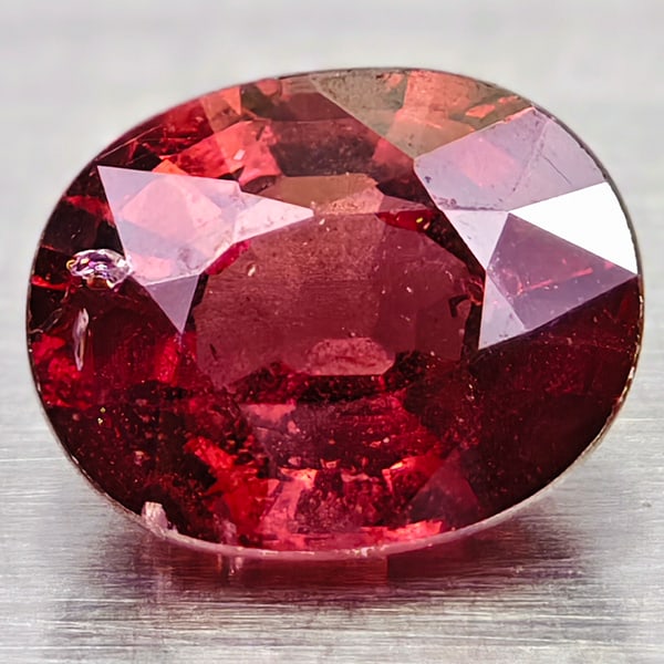 Natural Pink Red Rhodolite Garnet 0.90 Ct. Oval Shape 6.1 x 4.9 Mm Gemstone From Madagascar: Product ID: 102909334 Product Name: Natural Rhodolite Weight: 0.90 CT. Size: 6.1 x 4.9 x 3.4 MM. Shape: Oval Color: Pink Red Clarity:VSI Luster: Good Gems Origin: Madagascar Treatment: Unheated Crysta