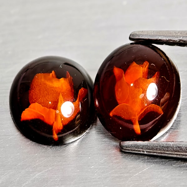 Natural Amber 0.90 Ct. 2 Pcs Flower Carving In Oval Cabochon Shape 8 x 6.7 Mm Gemstones From Poland: Product ID: 819091036 Product Name: Natural Amber Weight: 0.90 CT. Size: 8 x 6.7 x 2.7 MM. Shape: Oval Cabochon Color: Brown Yellow Clarity:Semi - Transparent Luster: Good Gems Origin: Poland Treatmen