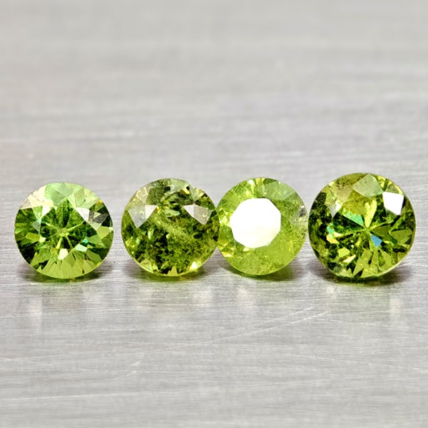 Natural Yellowish Green Demantoid Garnet 1.06 Ct. 4 Pcs Round Diamond Cut Gemstones From Madagascar: Product ID: 802936578 Product Name: Natural Demantoid Weight: 1.06 CT. Size: 4 x 4 x 3 to 3.7 x 3.7 x 2.5 MM. Shape: Round Diamond Cut Color: Yellowish Green Clarity:VSI Luster: Good Gems Origin: Mada
