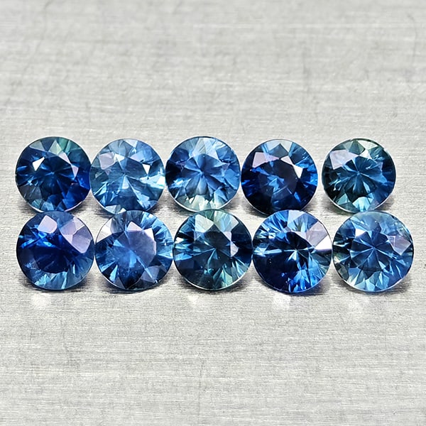 Natural Blue Sapphire 0.66 Ct. 10 Pcs Round Diamond Cut 2.5 Mm. Gemstones From Madagascar: Product ID: 806162616 Product Name: Natural Blue Sapphire Weight: 0.66 CT. Size: 2.5 x 2.5 x 1.7 MM. Shape: Round Diamond Cut Color: Blue Clarity:VVS Luster: Good Gems Origin: Madagascar Treatment: He