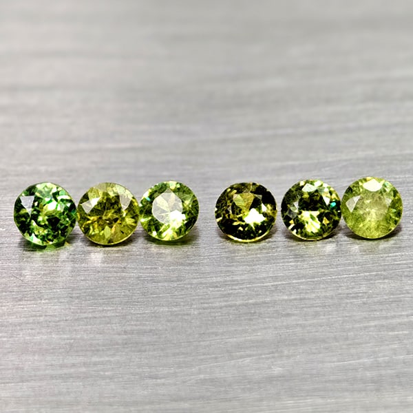 Natural Yellowish Green Demantoid Garnet 0.56 Ct. 6 Pcs Round Diamond Cut 2.7 Mm Gemstones From: Product ID: 802936579 Product Name: Natural Demantoid Weight: 0.56 CT. Size: 2.7 x 2.7 x 1.7 MM. Shape: Round Diamond Cut Color: Yellowish Green Clarity:VSI Luster: Good Gems Origin: Madagascar Treatm