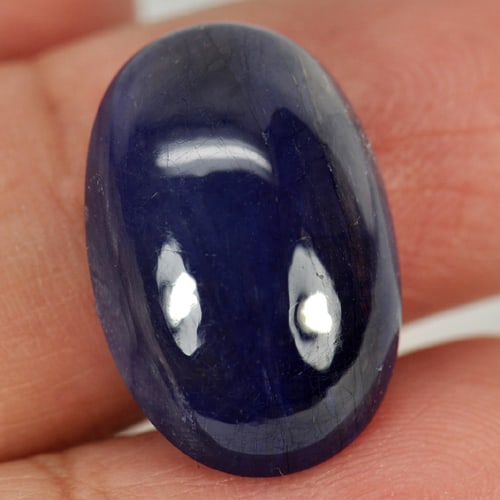 Natural Blue Sapphire 16.48 Ct. Oval Cabochon Shape 18.8 x 12.7 Mm Gemstone From Madagascar: Product ID: 806009821 Product Name: Natural Blue Sapphire Weight: 16.48 CT. Size: 18.8 x 12.7 x 6.8 MM. Shape: Oval Cabochon Color: Blue Clarity:Semi - Transparent Luster: Good Gems Origin: Madagascar