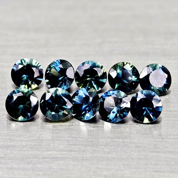 Natural Fancy Color Sapphire 1.22 Ct. 10 Pcs Round Diamand Cut 3 Mm Gemstones From Tanzania: Product ID: 806162160 Product Name: Natural Green Sapphire Weight: 1.22 CT. Size: 3 x 3 x 1.8 MM. Shape: Round Diamond Cut Color: Fancy Color Clarity:VSI Luster: Very Good Gems Origin: Tanzania Treatm
