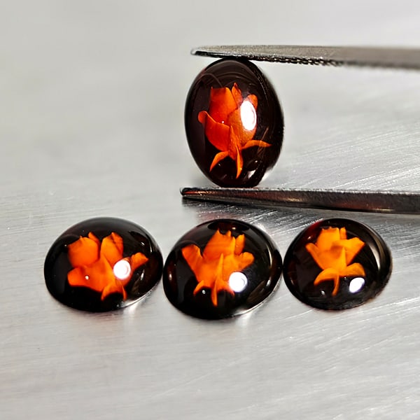 Flower Carving In Natural Brown Yellow Amber 2.23 Ct. 4 Pcs. Oval Cabochon Shape 9.5 x 7.1 Mm: Product ID: 819091004 Product Name: Natural Amber Weight: 2.23 CT. Size: 9.5 x 7.1 x 3.6 MM. Shape: Oval Cabochon Color: Brown Yellow Clarity:Semi - Transparent Luster: Good Gems Origin: Poland Treatm