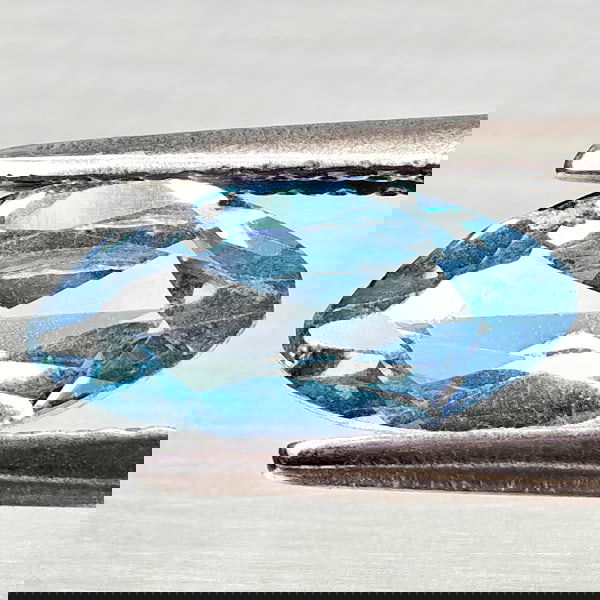 Natural Swiss Blue Topaz 1.08 Ct. Marquise Shape 9.6 x 4.8 Mm Gemstone From Brazil: Product ID: 807168203 Product Name: Natural Blue Topaz Weight: 1.08 CT. Size: 9.6 x 4.8 x 3 MM. Shape: Marquise Shape Color: Swiss Blue Clarity:VSI Luster: Good Gems Origin: Brazil Treatment: Treated