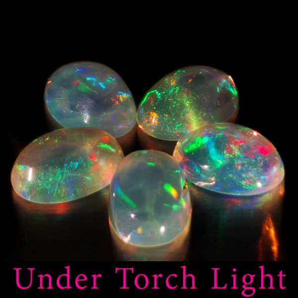 Natural Multi Color Opal 1.43 Ct. 5 Pcs Oval Cabochon Shape 6.1 x 4.2 Mm Gemstones From Ethiopia: Product ID: 818728089 Product Name: Natural Opal Weight: 1.43 CT. Size: 6.1 x 4.2 x 2.8 MM. Shape: Oval Cabochon Color: Multi-Color Clarity:Semi - Transparent Luster: Good Gems Origin: Ethiopia Treatm