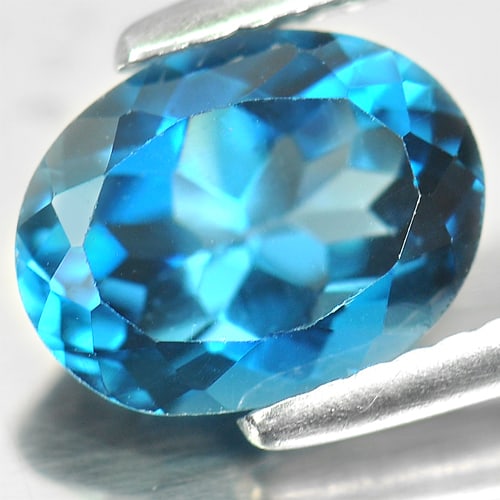 Natural London Blue Topaz 2.25 Ct. Oval Shape 9 x 7 Mm Gemstone From Brazil: Product ID: 807160964 Product Name: Natural Blue Topaz Weight: 2.25 CT. Size: 9 x 7 x 4.8 MM. Shape: Oval Color: London Blue Clarity:VVS Luster: Good Gems Origin: Brazil Treatment: Treated Crystal Str