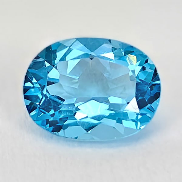 Natural Swiss Blue Topaz 2.16 Ct. Oval Shape 9 x 7 Mm Gemstone From Brazil: Product ID: 807167812 Product Name: Natural Blue Topaz Weight: 2.16 CT. Size: 9 x 7 x 4.4 MM. Shape: Oval Color: Blue Clarity:VSI Luster: Good Gems Origin: Brazil Treatment: Treated Crystal Structure: