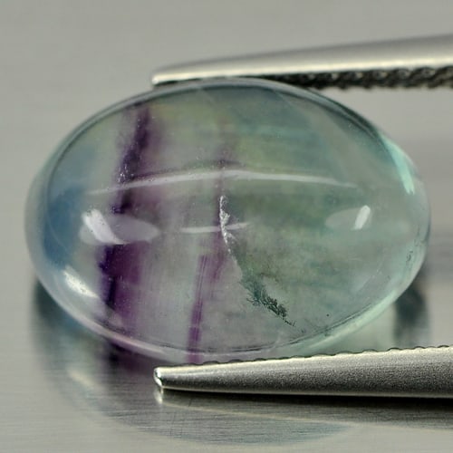 Natural Fluorite 7.66 Ct. Oval Cabochon Shape 14.2 x 10.3 Mm. Gemstone From Brazil: Product ID: 807803146 Product Name: Natural Fluorite Weight: 7.66 CT. Size: 14.2 x 10.3 x 5.6 MM. Shape: Oval Cabochon Color: See As On Picture Clarity:Semi - Transparent Luster: Good Gems Origin: Bra