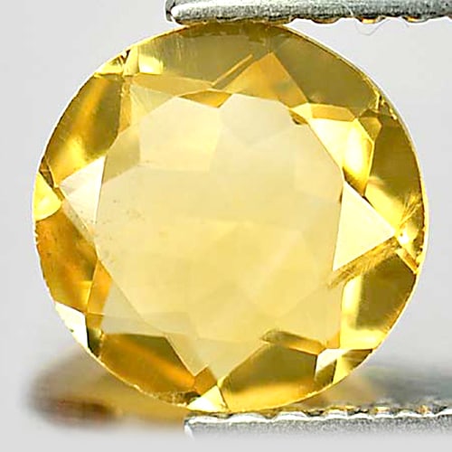Natural Yellow Citrine 1.04 Ct. Round Shape 7.3 Mm. Gemstone From Brazil: Product ID: 801811743 Product Name: Natural Citrine Weight: 1.04 CT. Size: 7.3 x 7.3 x 3.3 MM. Shape: Round Color: Yellow Clarity:VSI Luster: Good Gems Origin: Brazil Treatment: Unheated Crystal Struc