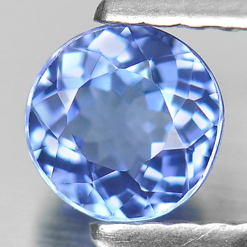 Natural Violetish Blue Tanzanite 0.64 Ct. Round Shape 5.1 Mm. Gemstone From Tanzania: Product ID: 807008204 Product Name: Natural Tanzanite Weight: 0.64 CT. Size: 5.1 x 5.1 x 3.2 MM. Shape: Round Color: Violetish Blue Clarity:VSI Luster: Good Gems Origin: Tanzania Treatment: Heated Cry