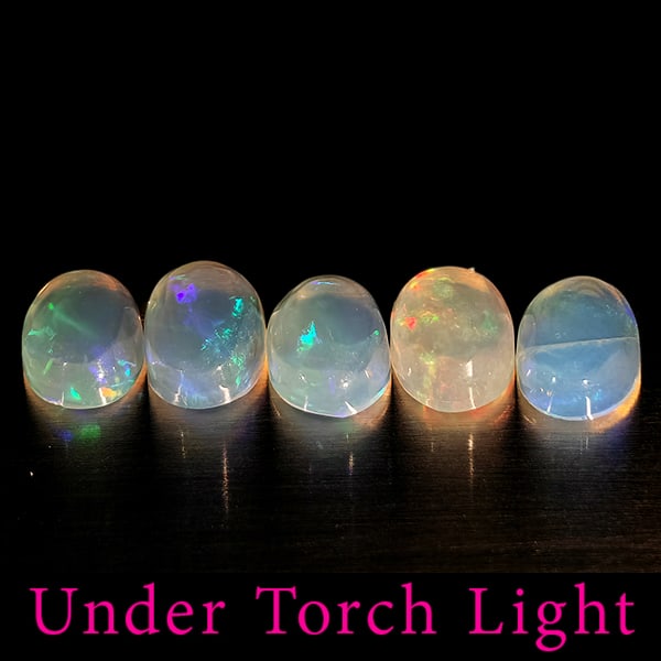 Natural Multi Color Opal 1.65 Ct. 5 Pcs Oval Cabochon Shape 6.1 x 4.1 Mm Gemstones From Ethiopia: Product ID: 818728076 Product Name: Natural Opal Weight: 1.65 CT. Size: 6.1 x 4.1 x 2.7 MM. Shape: Oval Cabochon Color: Multi-Color Clarity:Semi - Transparent Luster: Good Gems Origin: Ethiopia Treatm