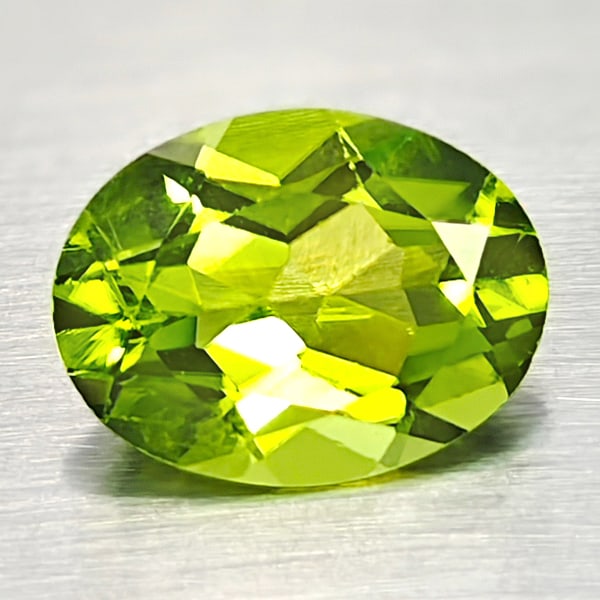 Natural Green Peridot 1.79 Ct. Oval Shape 6.8 x 9 Mm. Gemstones From Pakistan: Product ID: 805316929 Product Name: Natural Peridot Weight: 1.75 CT. Size: 6.8 x 9 x 4.3 MM. Shape: Oval Color: Green Clarity:VSI Luster: Good Gems Origin: Pakistan Treatment: Unheated Crystal Structu