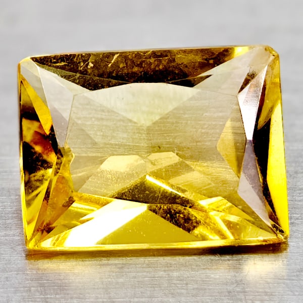 Natural Yellow Citrine 1.68 Ct. Clean Baguette Shape 8.9 x 6.8 Mm Gemstone From Brazil: Product ID: 801815043 Product Name: Natural Citrine Weight: 1.68 CT. Size: 8.9 x 6.8 x 4.1 MM. Shape: Baguette Color: Yellow Clarity:If Luster: Good Gems Origin: Brazil Treatment: Unheated Crystal Str