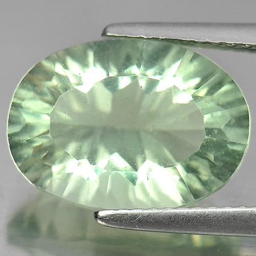 Natural Green Fluorite 6.79 Ct. Oval Concave Cut 14 x 10.1 Mm Gemstone From Brazil: Product ID: 802704711 Product Name: Natural Fluorite Weight: 6.79 CT. Size: 14 x 10.1 x 7.1 MM. Shape: Oval Concave Cut Color: Green Clarity:VSI Luster: Good Gems Origin: Brazil Treatment: Unheated Cr