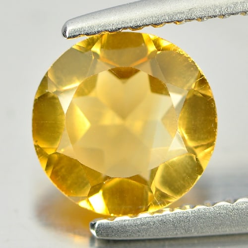 Natural Yellow Citrine 0.97 Ct. Round Shape 7.2 Mm. Gemstone From Brazil: Product ID: 801811101 Product Name: Natural Citrine Weight: 0.97 CT. Size: 7.2 x 7.2 x 3.7 MM. Shape: Round Color: Yellow Clarity:VSI Luster: Good Gems Origin: Brazil Treatment: Unheated Crystal Struc