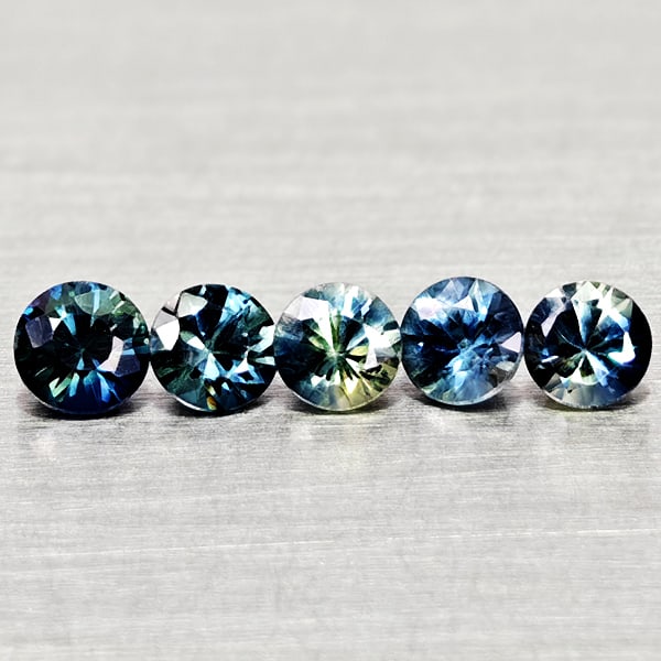 Natural Multi Color Sapphire 0.92 Ct. 5 Pcs Round Diamand Cut 3.6 Mm Gemstones From Tanzania: Product ID: 806162168 Product Name: Natural Green Sapphire Weight: 0.92 CT. Size: 3.6 x 3.6 x 2.4 MM. Shape: Round Diamond Cut Color: Fancy Color Clarity:VSI Luster: Very Good Gems Origin: Tanzania Tr