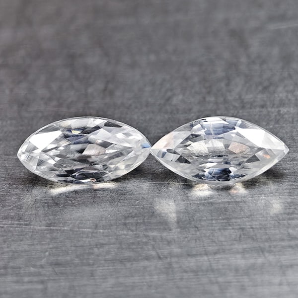 Natural White Zircon 1.36 Ct. 2 Pcs Marquise Shape 7.3 x 3.6 Mm Gemstones From Cambodia: Product ID: 807742897 Product Name: Natural Zircon Weight: 1.36 CT. Size: 7.3 x 3.6 x 2.9 MM. Shape: Marquise Color: White Clarity:VSI Luster: Very Good Gems Origin: Cambodia Treatment: Heated Crystal