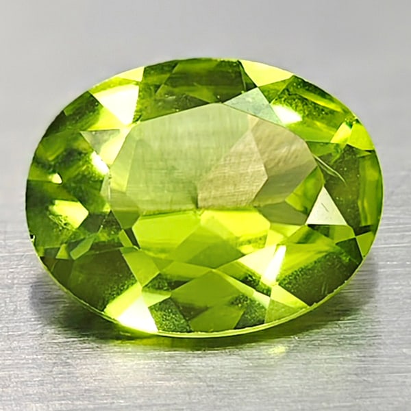 Natural Green Peridot 1.79 Ct. Oval Shape 7.2 x 9.1 Mm. Gemstone From Pakistan: Product ID: 805316925 Product Name: Natural Peridot Weight: 1.79 CT. Size: 7.2 x 9.1 x 3.9 MM. Shape: Oval Color: Green Clarity:VSI Luster: Good Gems Origin: Pakistan Treatment: Unheated Crystal Struc