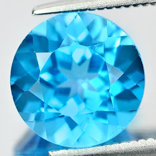 Natural Swiss Blue Topaz 3.84 Ct. Round Shape Size 9.2 Mm. Gemstone From Brazil: Product ID: 807155948 Product Name: Natural Blue Topaz Weight: 3.84 CT. Size: 9.2 x 9.2 x 6.4 MM. Shape: Round Color: Swiss Blue Clarity:VSI Luster: Good Gems Origin: Brazil Treatment: Treated Crystal