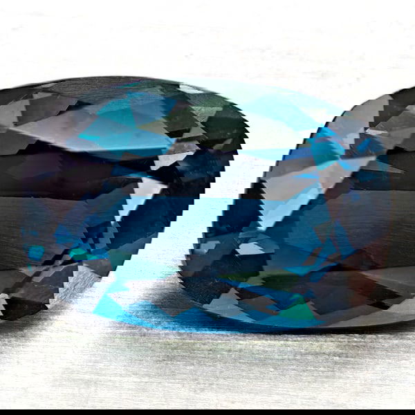 Natural London Blue Topaz 4.42 Ct. Cushion Shape 11.6 x 8.1 Mm Gemstone From Brazil: Product ID: 807168314 Product Name: Natural Blue Topaz Weight: 4.42 CT. Size: 11.6 x 8.1 x 5.6 MM. Shape: Cushion Shape Color: London Blue Clarity:VVS - VSI Luster: Good Gems Origin: Brazil Treatment: