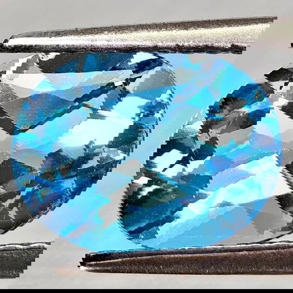 Natural Swiss Blue Topaz 2.13 Ct. Oval Shape 9.1 x 7 Mm Gemstone From Brazil: Product ID: 807168140 Product Name: Natural Blue Topaz Weight: 2.13 CT. Size: 9.1 x 7 x 4.6 MM. Shape: Oval Shape Color: Swiss Blue Clarity:VVS - VSI Luster: Good Gems Origin: Brazil Treatment: Treate