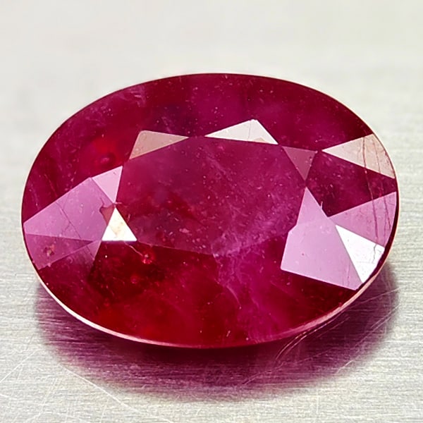 Natural Red Ruby 4.18 Ct. Oval Shape 11.4 x 8.6 Mm Gemstone From Madagascar: Product ID: 805935132 Product Name: Natural Ruby Weight: 4.18 CT. Size: 11.4 x 8.6 x 4.3 MM. Shape: Oval Color: Red Clarity:SI Luster: Good Gems Origin: Madagascar Treatment: Heated (Lead-glass fillin
