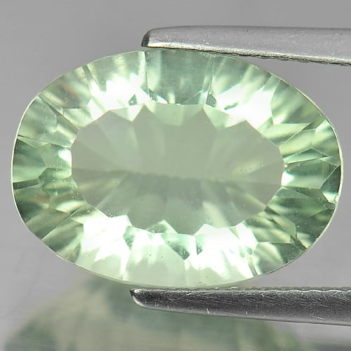 Natural Green Fluorite 6.43 Ct. Oval Concave Cut 14 x 10.2 Mm Gemstone from Brazil: Product ID: 802704218 Product Name: Natural Fluorite Weight: 6.43 CT. Size: 14 x 10.2 x 6.7 MM. Shape: Oval Concave Cut Color: Green Clarity:VSI Luster: Good Gems Origin: Brazil Treatment: Unheated Cr