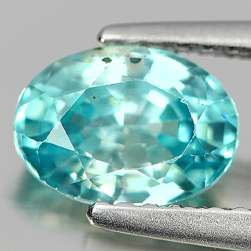 Natural Blue Zircon 1.64 Ct. Oval Shape 7.6 x 5.5 Mm Gemstone From Cambodia: Product ID: 807714882 Product Name: Natural Zircon Weight: 1.64 CT. Size: 7.6 x 5.5 x 3.9 MM. Shape: Oval Color: Blue Clarity:SI Luster: Good Gems Origin: Cambodia Treatment: Heated Crystal Structure:
