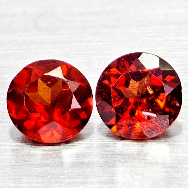 Natural Orangish Red Garnet 1.10 Ct. 2 Pcs Round Shape 5 Mm Gemstones From Tanzania: Product ID: 802936727 Product Name: Natural Red Garnet Weight: 1.10 CT. Size: 5 x 5 x 3.1 MM. Shape: Round Shape Color: Orangish Red Clarity:VSI - SI1 Luster: Good Gems Origin: Tanzania Treatment: Unh