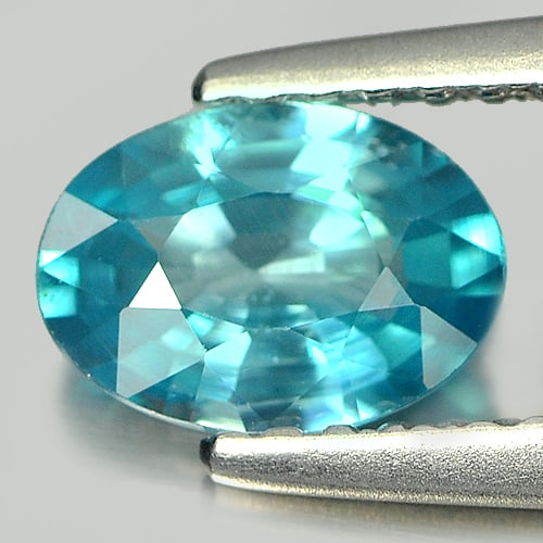 Natural Blue Zircon 1.08 Ct. Oval Shape 7 x 5 Mm. Gemstone From Cambodia: Product ID: 807728888 Product Name: Natural Zircon Weight: 1.08 CT. Size: 7 x 5 x 2.8 MM. Shape: Oval Color: Blue Clarity:VSI Luster: Good Gems Origin: Cambodia Treatment: Heated Crystal Structure: Te