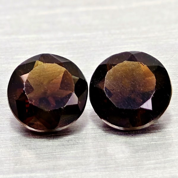 Natural Smokey Quartz 1.21 Ct. 2 Pcs Round Shape 5.7 Mm Gemstones From Brazil: Product ID: 805529907 Product Name: Natural Quartz Weight: 1.21 CT. Size: 5.7 x 5.7 x 3.4 MM. Shape: Round Color: Smokey Clarity:VSI Luster: Good Gems Origin: Brazil Treatment: Unheated Crystal Struct
