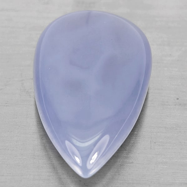 Natural Lavender Chalcedony 50.99 Ct. Pear Cabochon Shape 36 x 21 Mm Gemstone From Russia: Product ID: 801502656 Product Name: Natural Chalcedony Weight: 50.99 CT. Size: 36 x 21 x 9.7 MM. Shape: Pear Cabochon Color: Lavender Clarity:Semi - Transparent Luster: Good Gems Origin: Russia Treatm