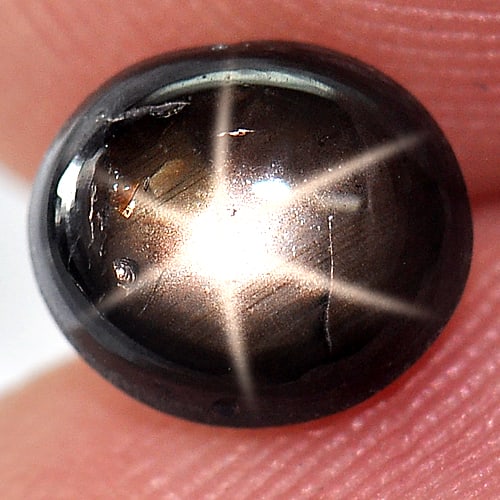 Natural Black Star Sapphire 6 Rays 1.64 Ct. Oval Cabochon Shape 7 x 6 Mm Gemstone From Thailand: Product ID: 806127423 Product Name: Natural Star Sapphire Weight: 1.64 CT. Size: 7 x 6 x 3.5 MM. Shape: Oval Cabochon Color: Black Clarity:Opaque Luster: Good 6 Rays Star Gems Origin: Thailand Treatme