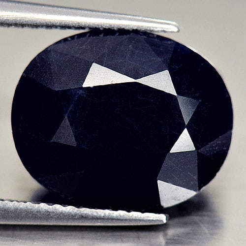 Natural Deep Blue Sapphire 9.42 Ct. Oval Shape 13.4 x 11 Mm Gemstone From Madagascar: Product ID: 806090010 Product Name: Natural Blue Sapphire Weight: 9.42 CT. Size: 13.4 x 11 x 7 MM. Shape: Oval Color: Deep Blue Clarity:Opaque Luster: Good Gems Origin: Madagascar Treatment: Heated Cr
