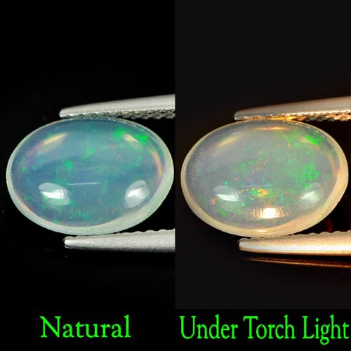 Natural Multi Color Opal 1.65 Ct. Oval Cabochon 11.3 x 8.6 Mm. Unheated Gemstone: Product ID: 818722237 Product Name: Natural Opal Weight: 1.65 CT. Size: 11.3 x 8.6 x 3.8 MM. Shape: Oval Cabochon Color: Multi Color Clarity:Semi - Transparent Luster: Strong Iridescent Gems Origin: E