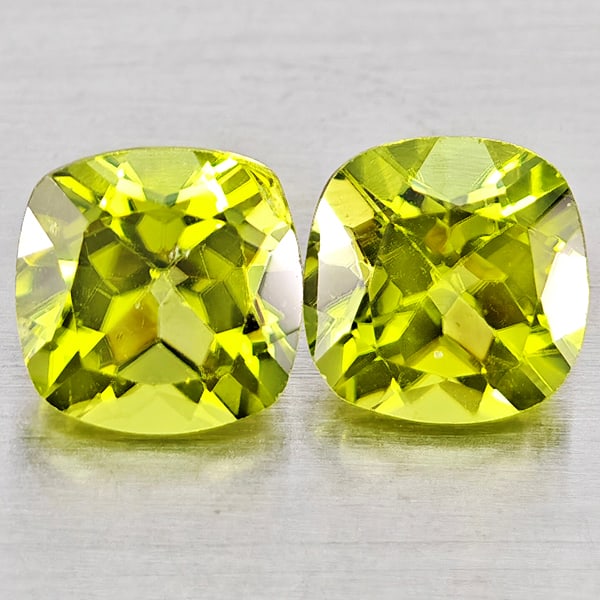Natural Green Peridot 1.45 Ct. 2 Pcs Cushion Shape 6 Mm. Gemstones from Pakistan: Product ID: 805317364 Product Name: Natural Peridot Weight: 1.45 CT. Size: 6 x 6 x 4.1 MM. Shape: Cushion Shape Color: Green Clarity:VSI Luster: Good Gems Origin: Pakistan Treatment: Unheated Crystal