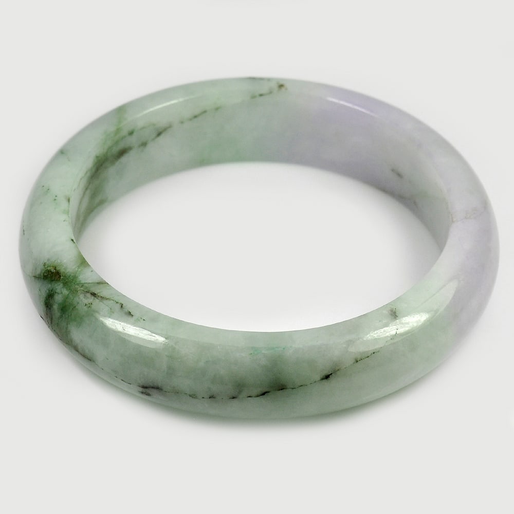 Natural Multi-Color Jade 414 Ct. Bangle Round Shape 80 x 62 Mm Gemstone from Thailand: Product ID: 819814216 Product Name: Natural Jade Weight: 414.00 CT. Size: 80 x 62 x 16 MM. Shape: Round Color: Multi-Color Clarity:Opaque Luster: Good Gems Origin: Thailand Treatment: Unheated Crystal