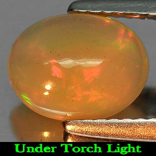 Natural Multi Color Opal 1.13 Ct. Oval Cabochon Shape 9 x 7 Mm. Gemstone From Ethiopia: Product ID: 818725473 Product Name: Natural Opal Weight: 1.13 CT. Size: 9 x 7 x 4.3 MM. Shape: Oval Cabochon Color: Multi-Color Clarity:Semi - Transparent Luster: Iridescent Gems Origin: Ethiopia Trea